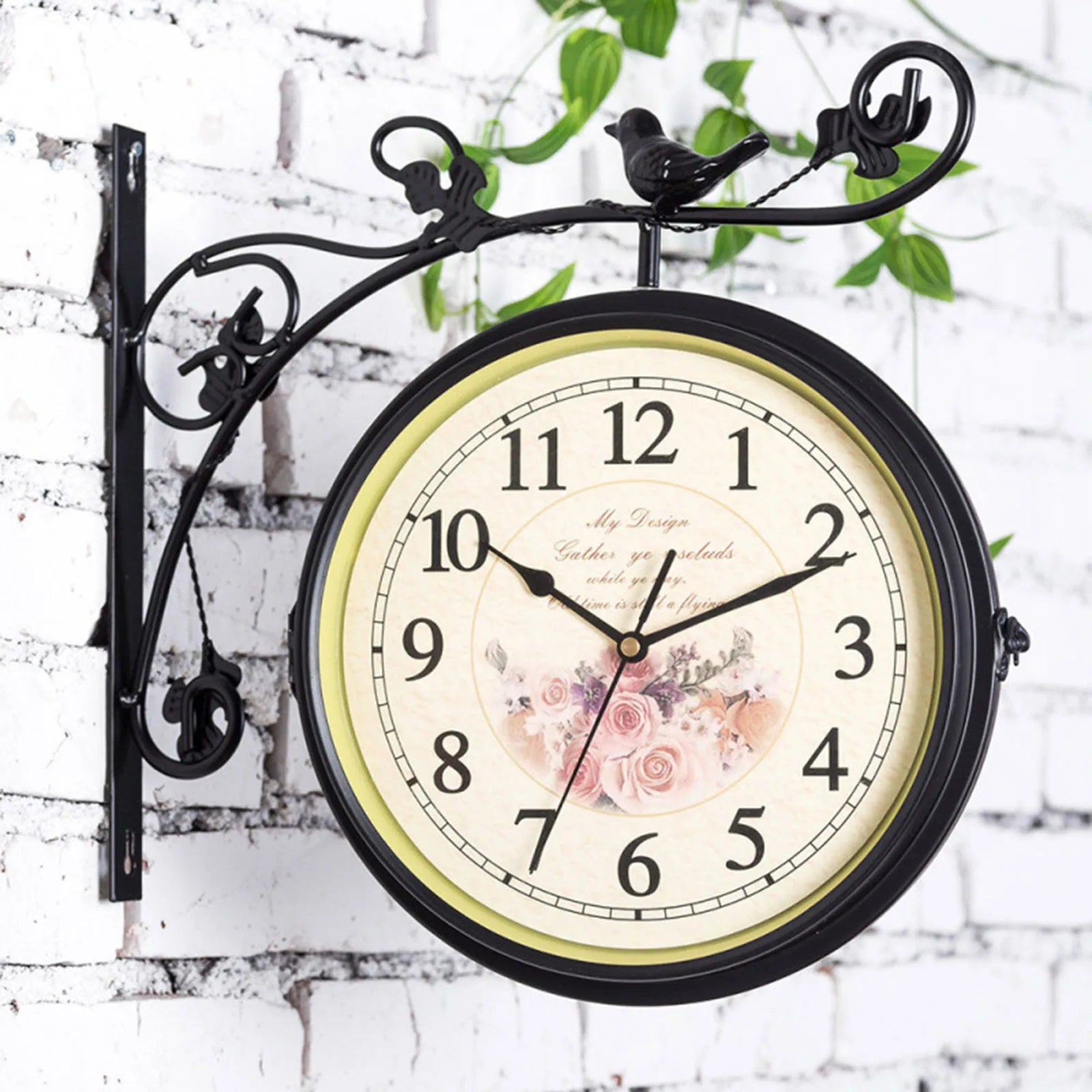 Double sided wall-mounted clock with floral design and bird ornaments, 25cm diameter, suitable for indoor and outdoor use.