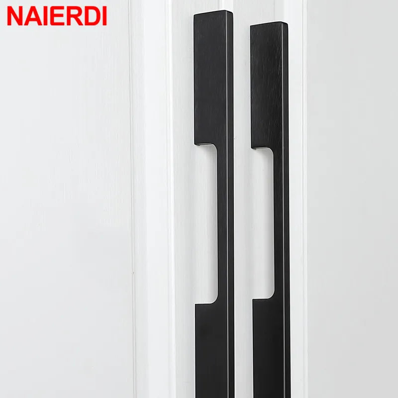 NAIERDI matte black cabinet door handles mounted on a white door, showcasing a modern and sleek design.