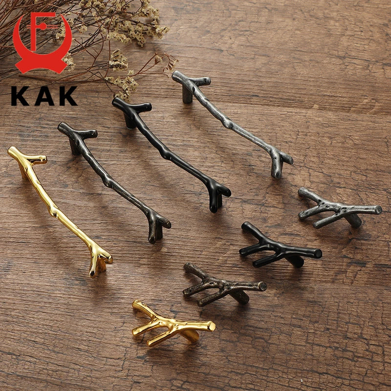 KAK 10-piece tree branch furniture handle set in black, silver, and bronze, available in 96mm and 128mm sizes for kitchen cabinets and drawers.