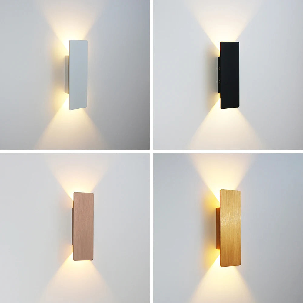 Modern LED wall lamp in four finishes: white, black, brown, and wood. Emits warm light upwards and downwards.
