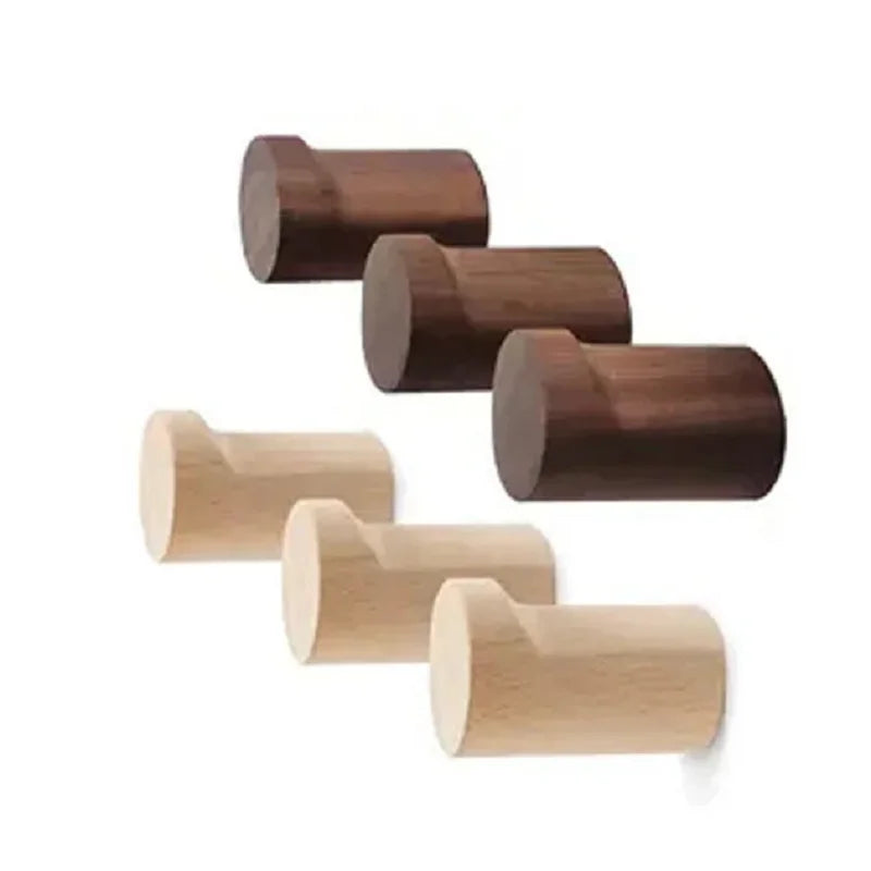 Modern minimalist walnut coat hooks in light and dark finishes, wall-mounted design.