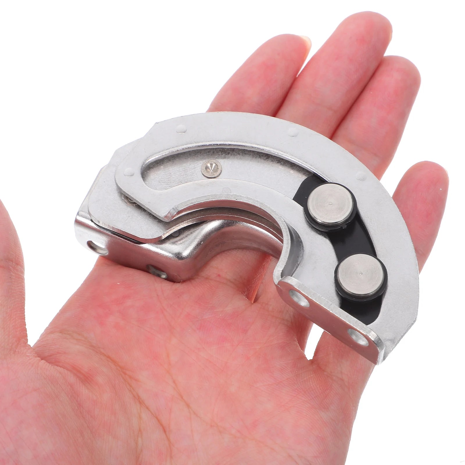 Curved stainless steel concealed cabinet hinge with swivel mechanism for slide doors, 90-degree opening, held in hand for scale.