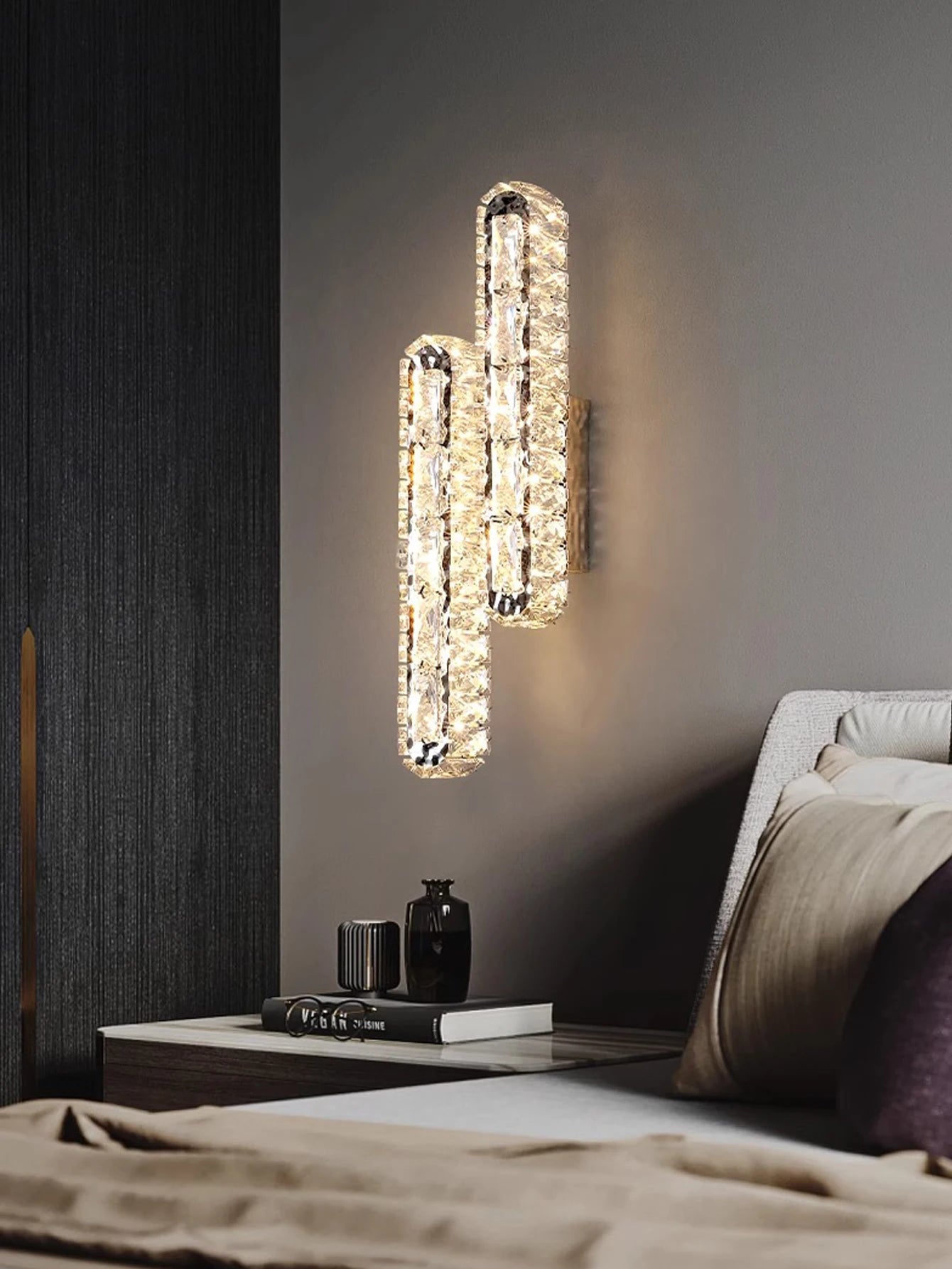 Gold and silver wall lamp with crystal strip, perfect for living room or bedside decoration.