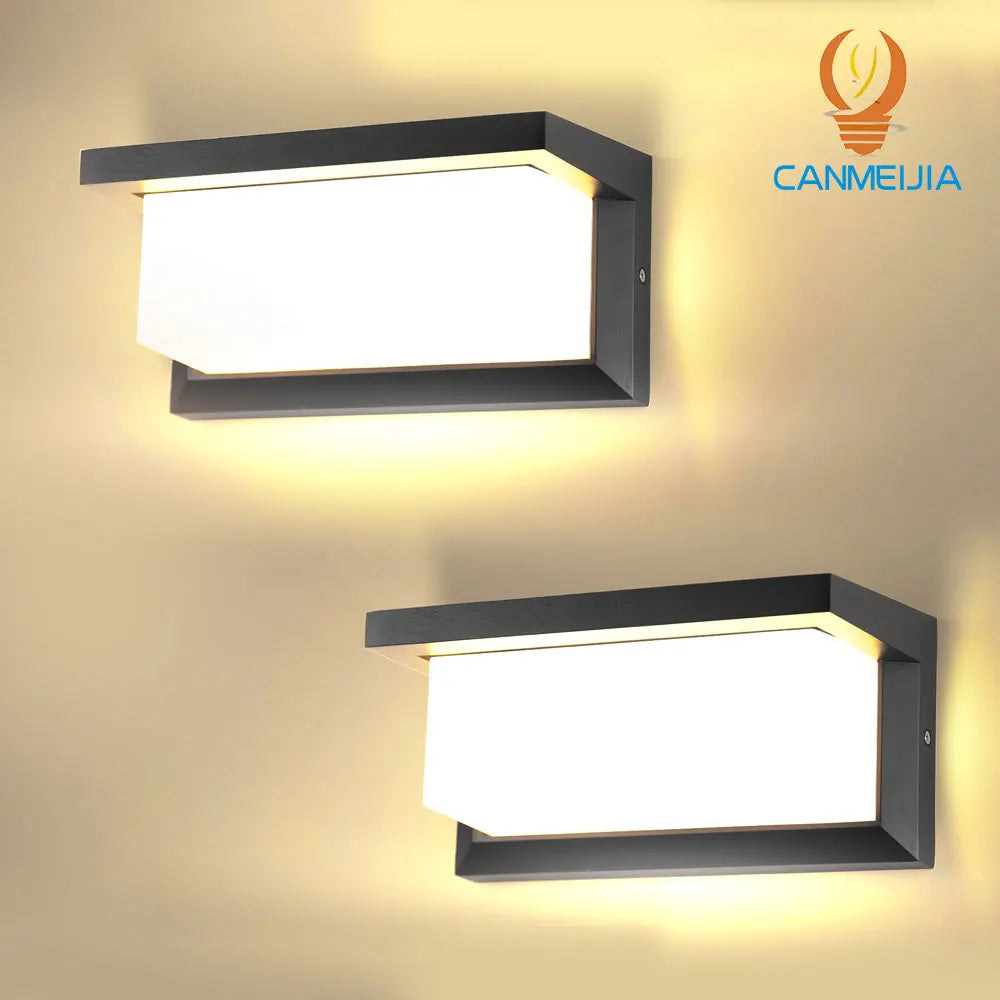 Modern vintage LED wall lamps with black frame and warm white light for indoor decoration.