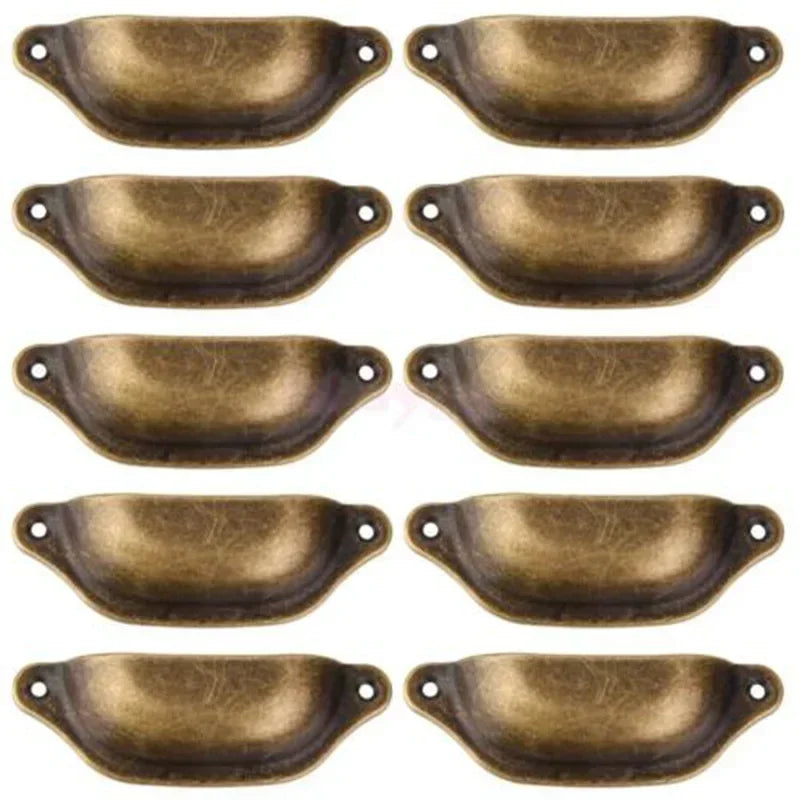 Set of 10 retro antique iron cupboard handles in industrial chic style with a brass finish.