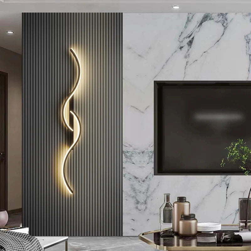 Modern minimalist LED wall lamp with warm white light on a ribbed wall in a stylish living room setting with marble accents.