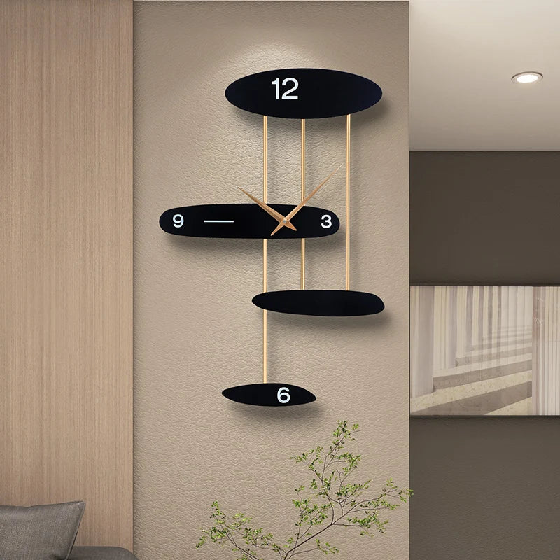 Modern Light Luxury Wall Mounted Clock with Black Ovals and Gold Accents in a Minimalist Home Setting