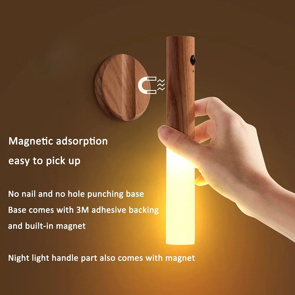 Rechargeable wooden wall sconce with magnetic adsorption and motion sensor, shown with adhesive mounting and glowing light.