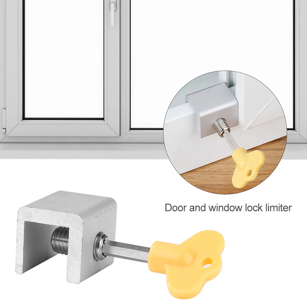 Secure aluminum window lock with yellow key, shown on a window frame, ideal for home security.