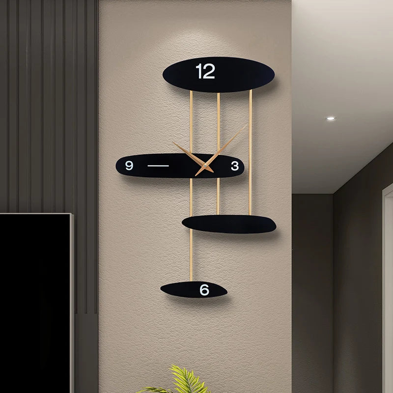 Modern light luxury wall-mounted clock with black face and gold hands, featuring a creative minimalist design on a beige textured wall.