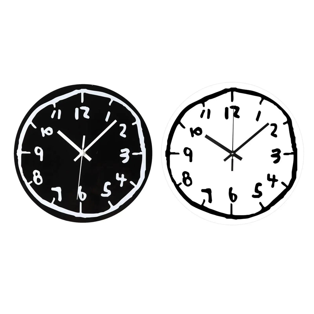 Unique artistic wall clocks with black and white designs, ideal for modern home decor in living rooms, kitchens, or study rooms.