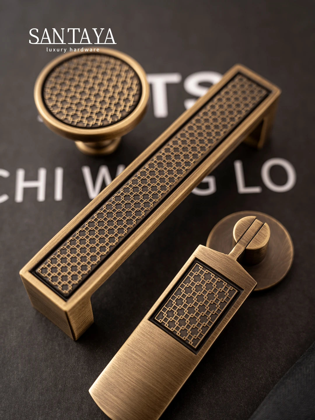 Antique brass handle with luxury bronze finish featuring geometric patterns for kitchen cabinets and wardrobes.