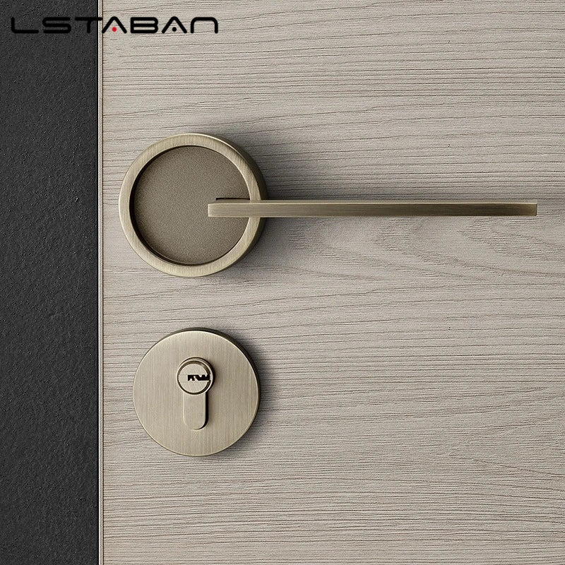Round door lock set with vintage American style, featuring a brushed metal finish and retro keyhole design on a wood-grain surface.