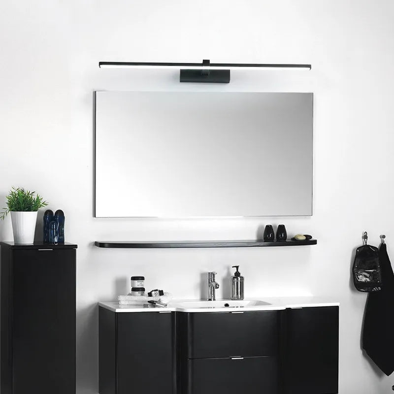 Modern LED mirror light in a black and white bathroom setup with a sleek design, perfect for makeup and bathroom lighting.