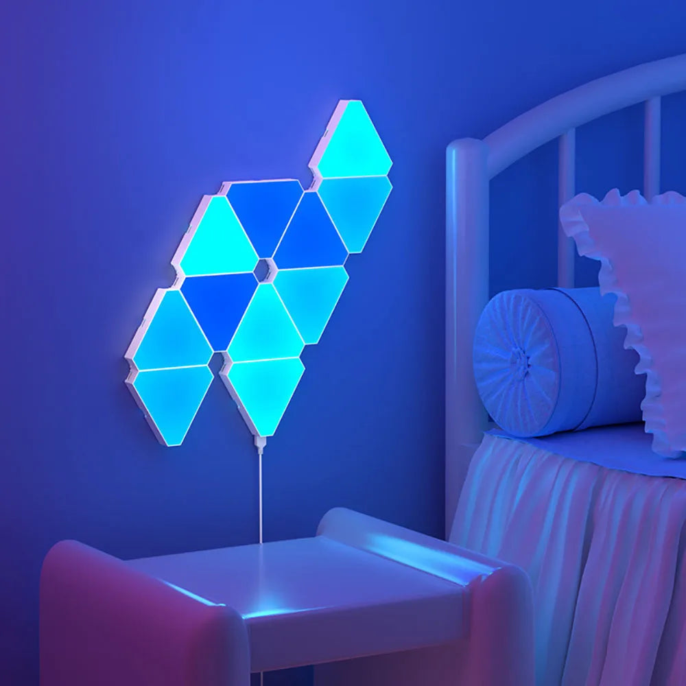 LED Triangular Quantum Lamp with RGB lighting on a bedroom wall, showcasing smart rhythm pickup features.