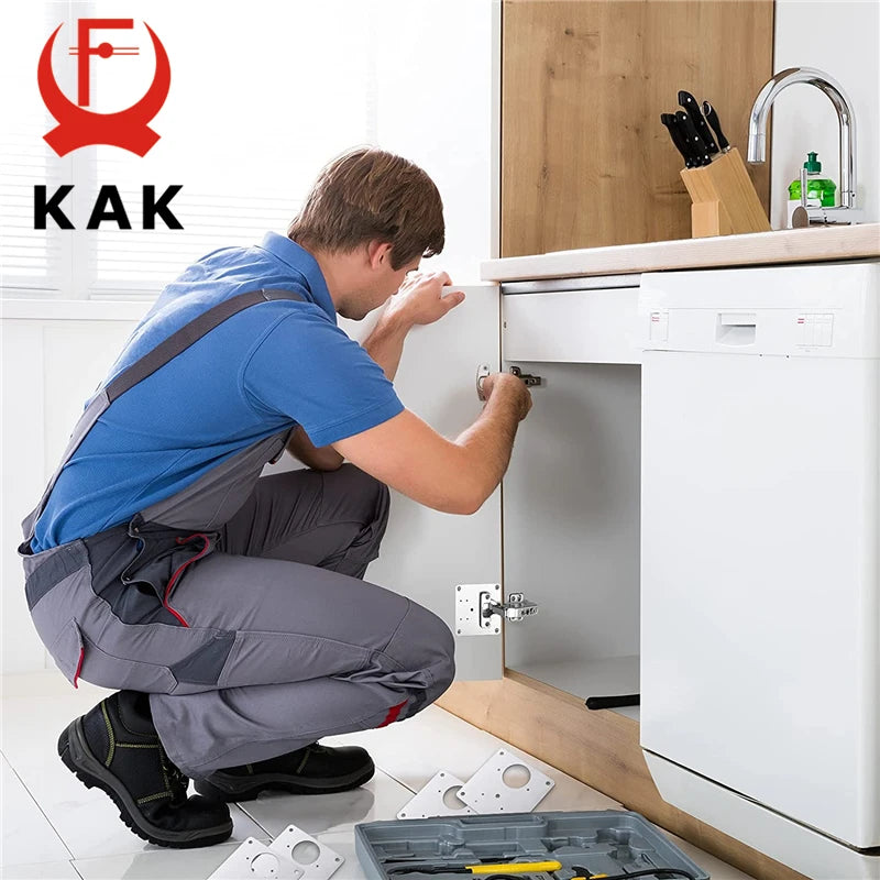 Person installing KAK 8pcs Hinge Repair Plate Kit in a modern kitchen cabinet. Includes stainless steel plates and screws.