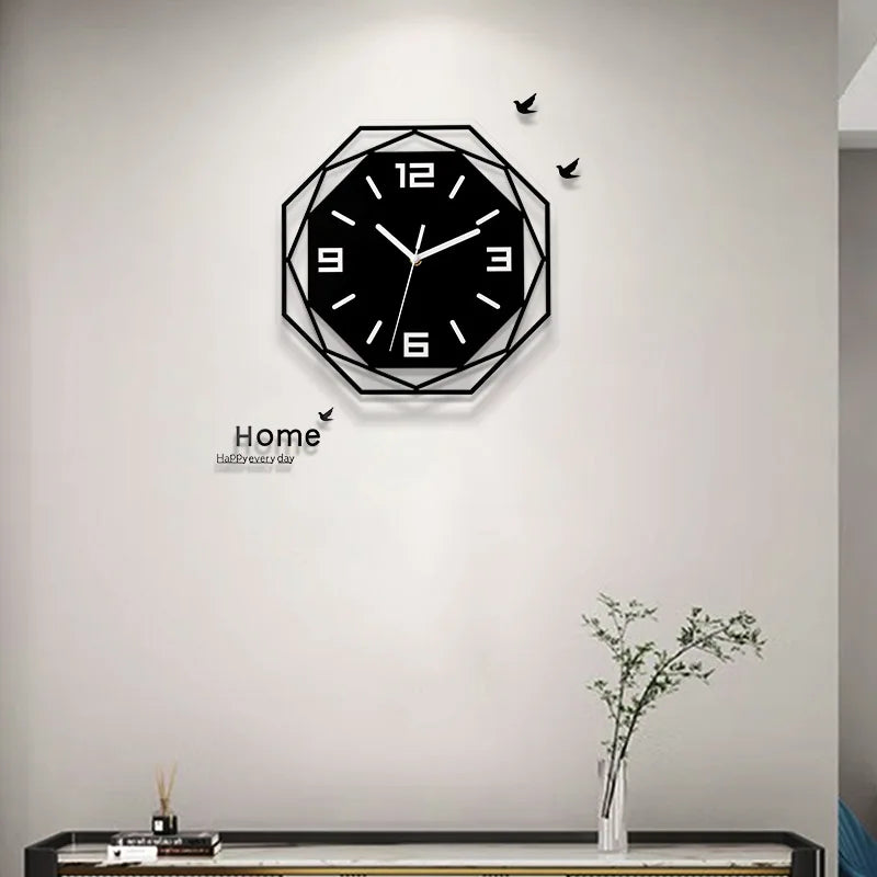 Modern minimalist decorative wall clock with black and white design, featuring a silent acrylic quartz mechanism and geometric frame.