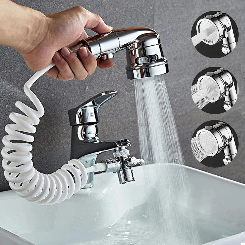 Chrome faucet shower head extender with flexible coiled hose and adjustable spray settings in bathroom sink.