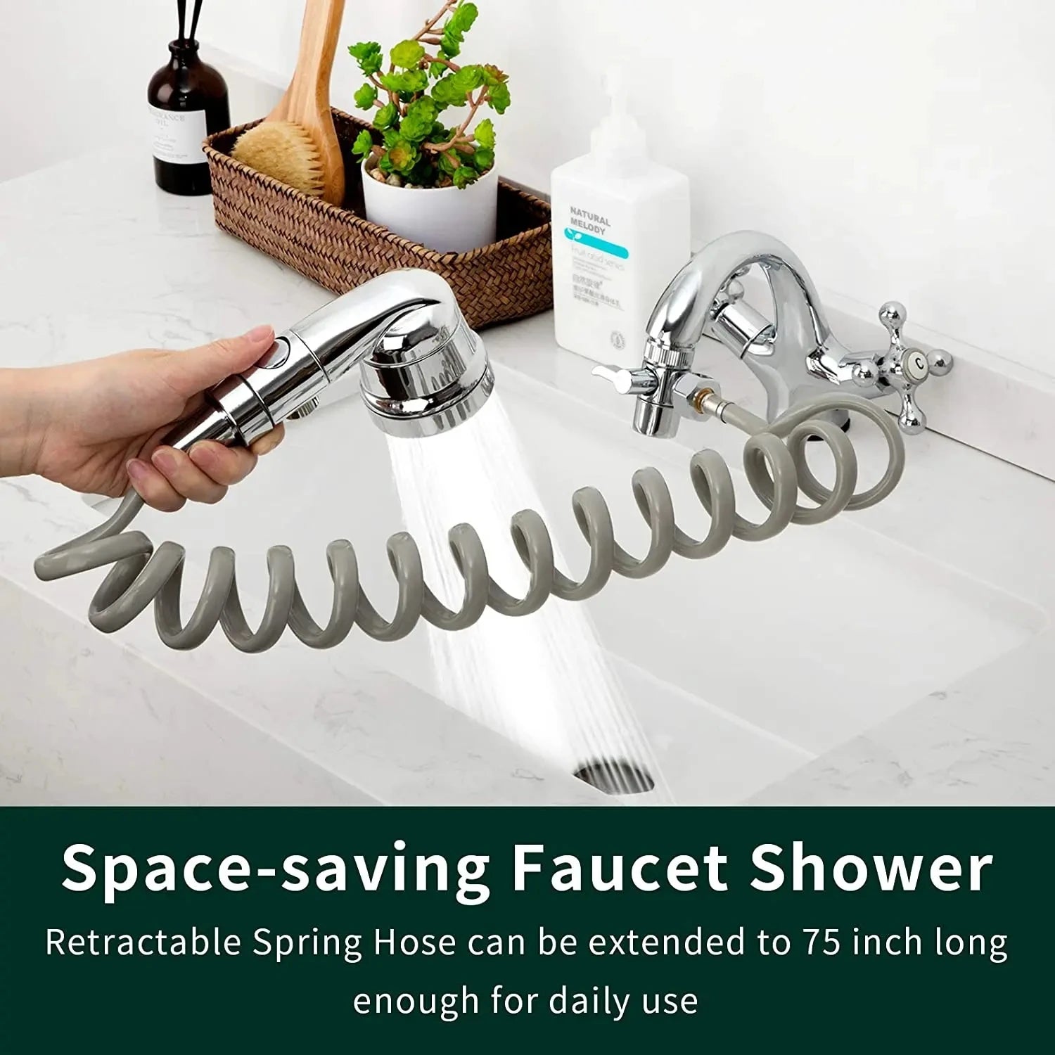 Chrome faucet shower head extender with retractable spring hose, water flowing into sink, set in modern bathroom.