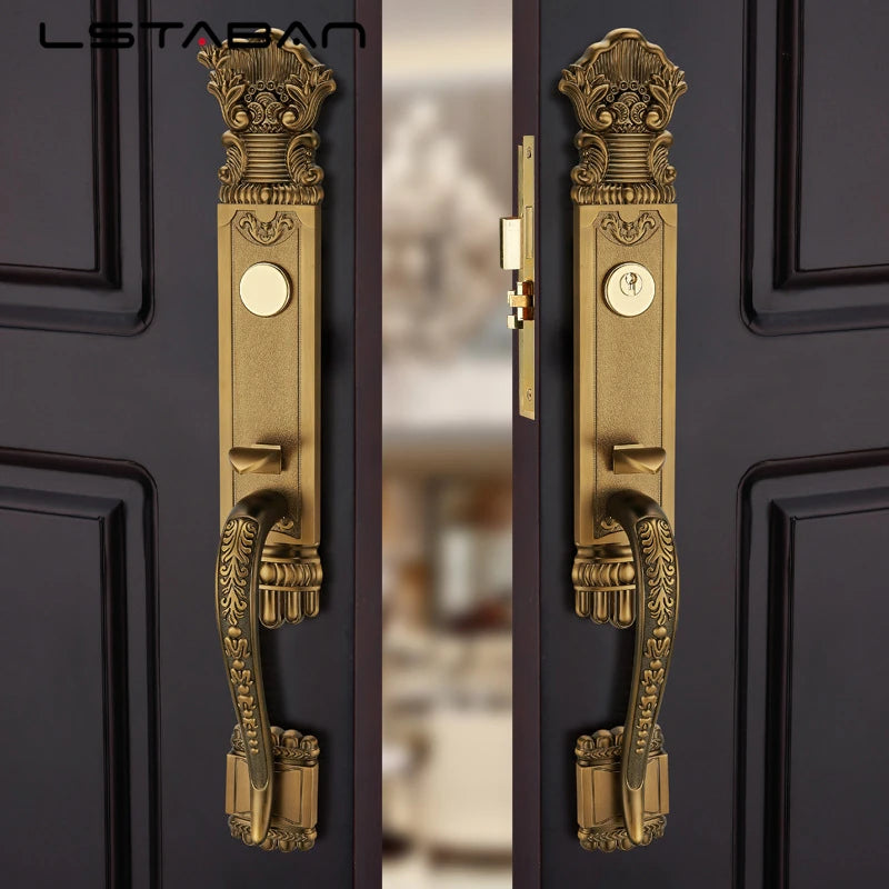 Premium European villa door lock in antique brass with ornate design on dark wood doors.