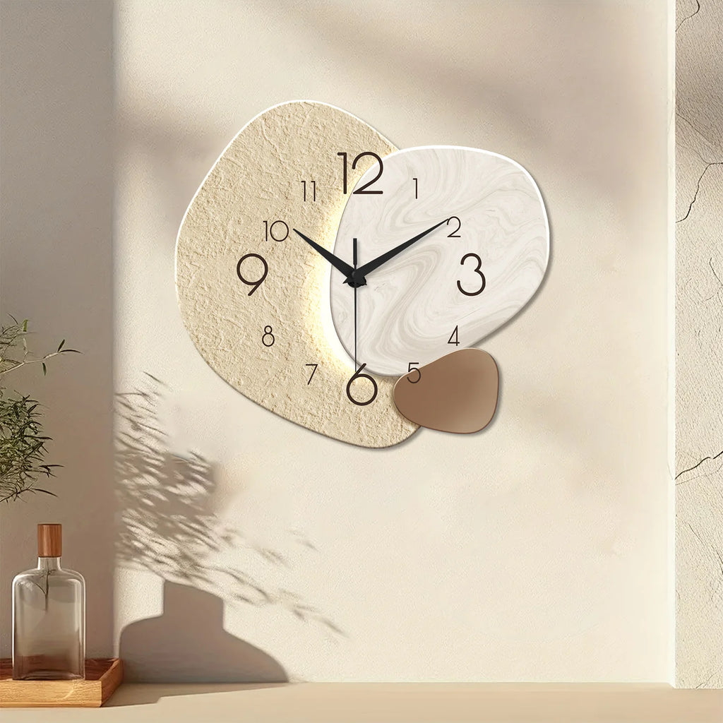 Modern simple wall clock with silent quartz mechanism, featuring an abstract design in beige and white, displayed on a light wall with minimalist decor.