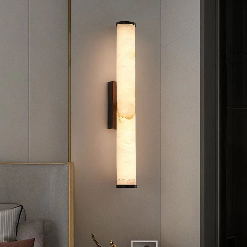 Luxurious marble modern wall lamp with warm glow, perfect for living room or bedroom decoration.