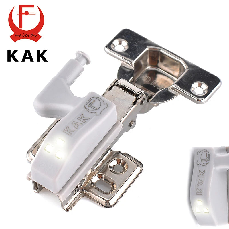 KAK LED cabinet hinge light with inner sensor for universal cupboard installation, 0.25W power, shown illuminated.